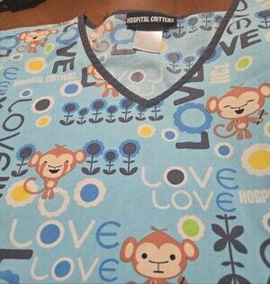 Ladies Scrub Top  In Blue Monkey Print SIze Large
